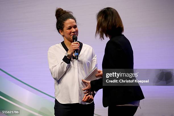 Selia Sasis speaks to moderator Asli Sevindim attend the DFB & Mercedes Benz Integration Prize Award Gala at German Football Museum on March 14, 2016...