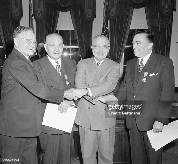 Attending the graduation exercises for the present class in the FBI National Police Academy were : Edsel Ford; FBI Director J. Edgar Hoover: General...