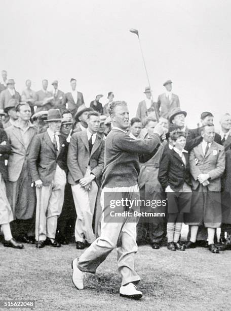 At the 1933 British Open Golf Championship at St. Andrew's, Scotland, US contender Craig Wood drives off from the first tee in an 18-hold playoff...
