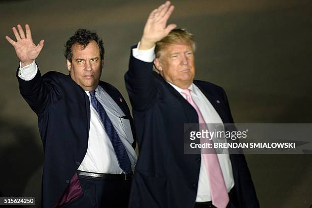 New Jersey Governor Chris Christie and US Republican presidential hopeful Donald Trump depart a rally March 14, 2016 in Vienna Center, Ohio. The six...