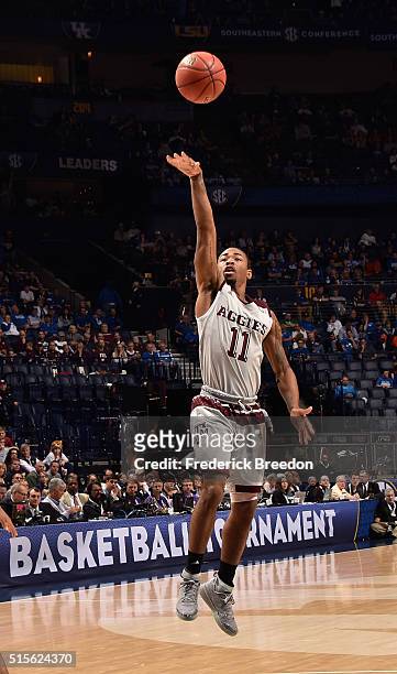 Anthony Collins of the Texas A&M Aggies takes a shot against the LSU Tigers in an SEC Basketball Tournament Semifinals game at Bridgestone Arena on...