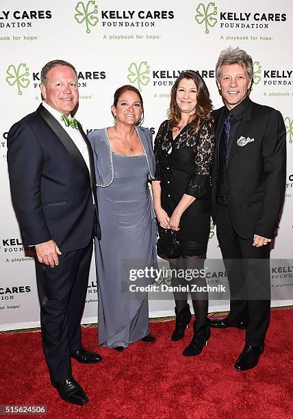 Co-founders of Kelly Cares, Brian Kelly and Paqui Kelly pose with Dorothea Hurley and musician Jon Bon Jovi during the Kelly Cares Foundation 2016...