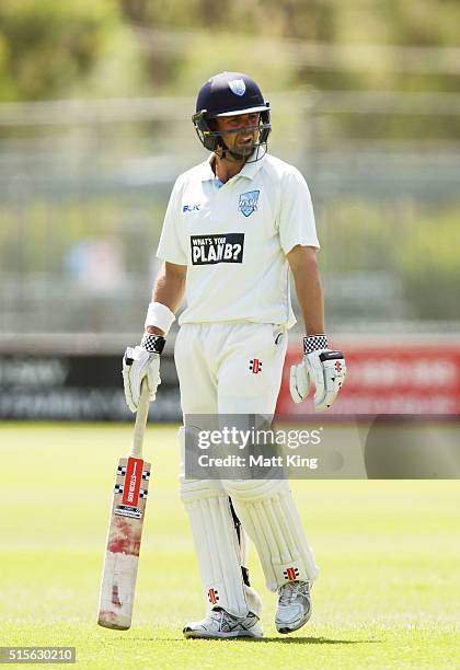Ed Cowan of the Blues reacts after being dismissed by Marcus Stoinis of the Bushrangers during day one of the Sheffield Shield match between Victoria...