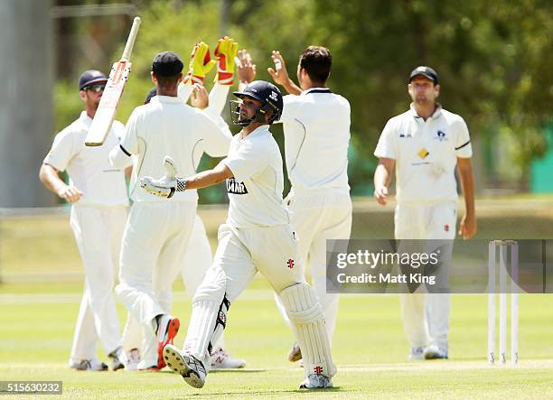 Ed Cowan of the Blues reacts after being dismissed by Marcus Stoinis of the Bushrangers during day one of the Sheffield Shield match between Victoria...
