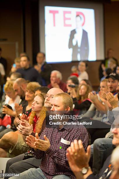 Guests react while U.S. Senator Ted Cruz speaks at a campaign rally on March 14, 2016 in Decatur, Illinois. The Illinois primary is March 15.