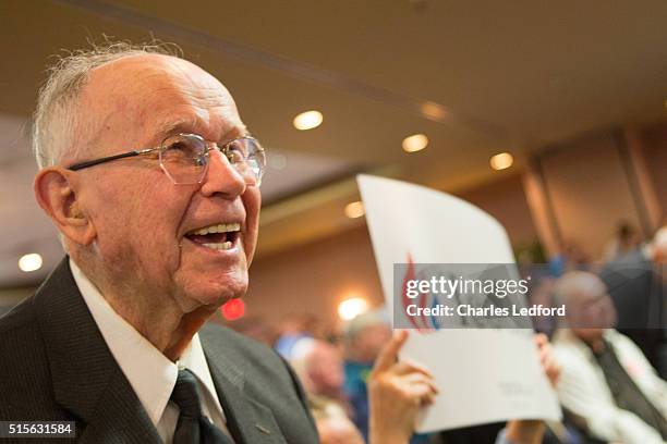 The Rev. Wilson Douglas of Springfield, Illinois, reacts as U.S. Senator Ted Cruz speaks at a campaign rally for the candidate on March 14, 2016 in...
