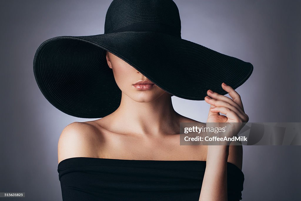 Studio shot of young beautiful woman