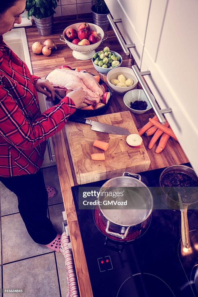 Preparing Traditional Holiday Goose with Side Dishes