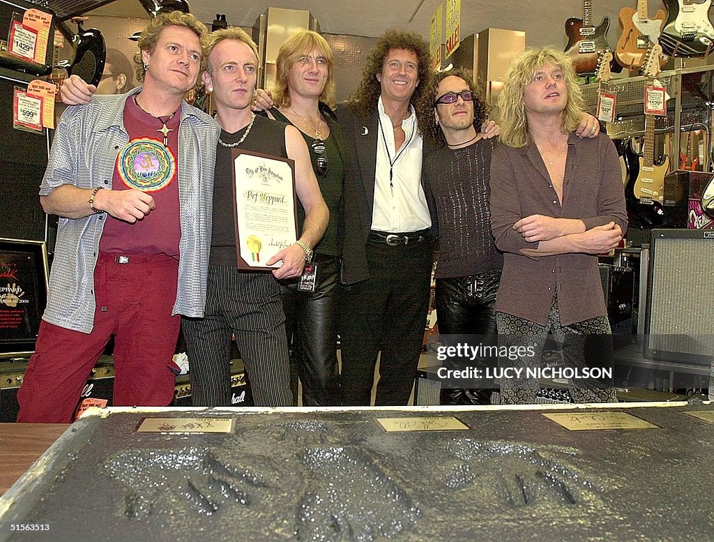 British heavy metal rock group 'Def Leppard' pose