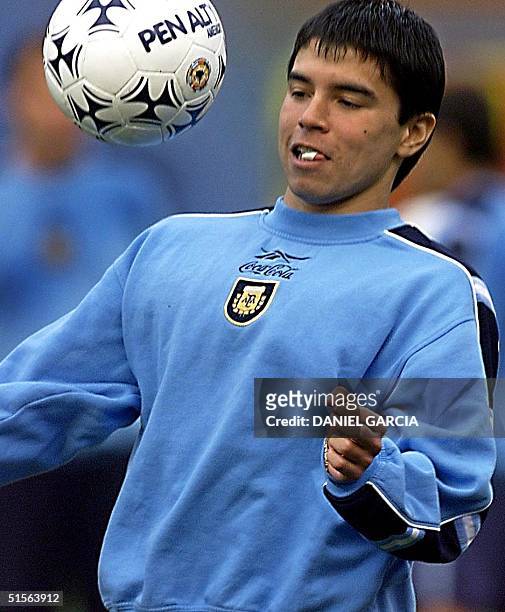 Javier Saviola , a player for Argentina's Select Soccer team, balances the ball, in the National Stadium, in Lima, Peru, 02 September 2000. Peru and...