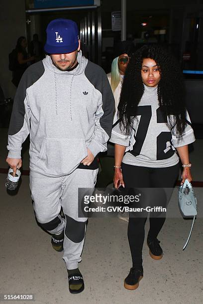 Rob Kardashian and Blac Chyna are seen at LAX on March 14, 2016 in Los Angeles, California.