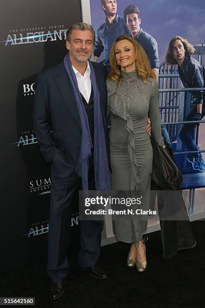 Actor Ray Stevenson and Elisabetta Caraccia attend the premiere of "Allegiant" held at the AMC Loews Lincoln Square 13 theater on March 14, 2016 in...