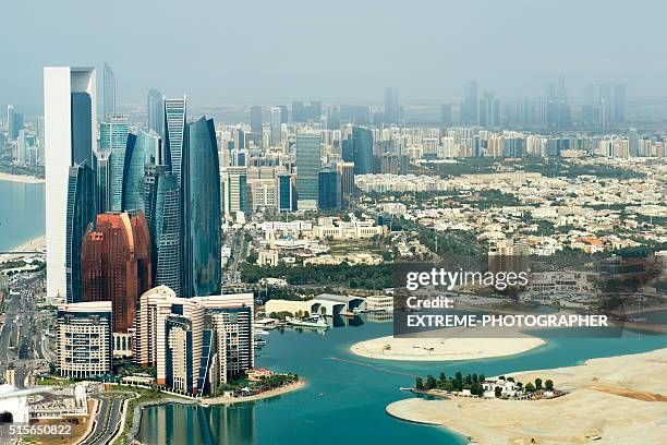 abu dhabi viewed from the sky - abu dhabi oil stock pictures, royalty-free photos & images