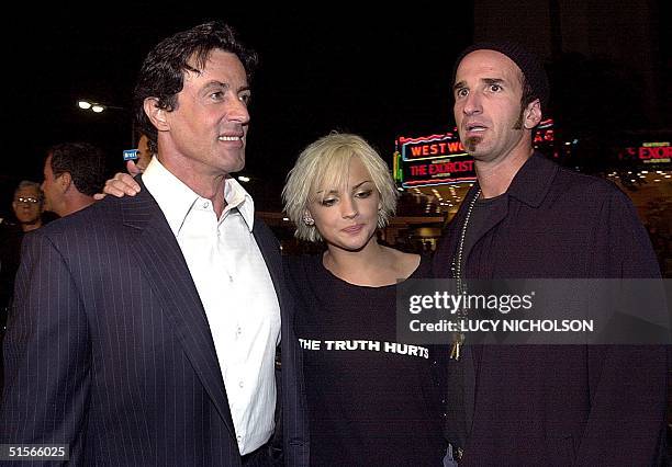 Actor Sylvester Stallone arrives at the premiere of his new film "Get Carter" with co-star Rachael Leigh Cook and director Stephen Kay , in Los...