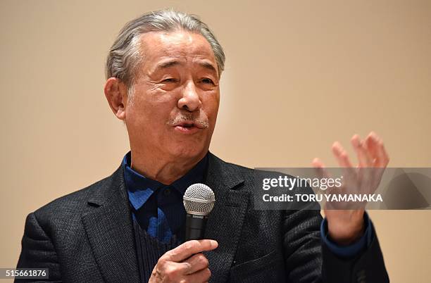 Japanese designer Issey Miyake participates in a press conference for the Miyake Issey Exhibition at the National Art Center in Tokyo on March 15,...