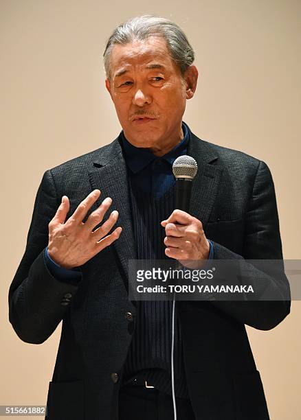 Japanese designer Issey Miyake participates in a press conference for the Miyake Issey Exhibition at the National Art Center in Tokyo on March 15,...