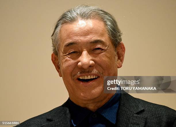 Japanese designer Issey Miyake participates in a press conference for the Miyake Issey Exhibition at the National Art Center in Tokyo on March 15,...