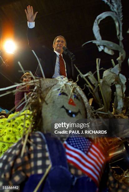 Republician presidential candidate and Texas Governor George W. Bush waves to the crowd Dixie Classic Fairgrounds in Winston-Salem, North Carolina...