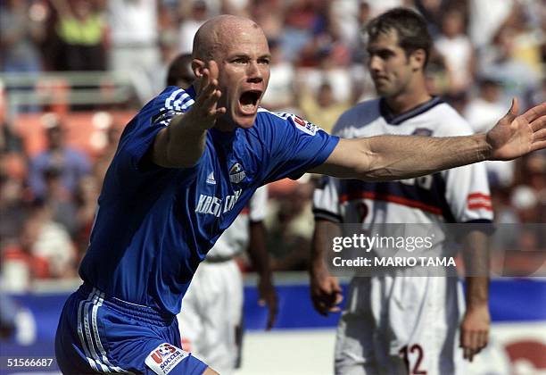 Kansas City Wizard forward Miklos Molnar celebrates after scoring the game's first goal against the Chicago Fire during the MLS Cup 2000 championship...