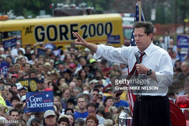 Democratic Presidential candidate US Vice President Al Gore gestures to supporters during a rally in Davenport, Iowa, 26 October 2000. Iowa is a...