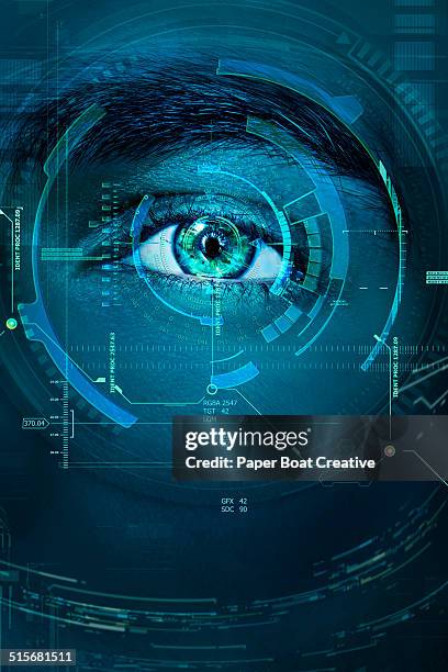 futuristic scan of a man's eye in a lab - iris mann stock-fotos und bilder