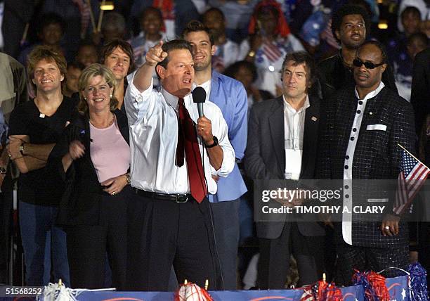 Democratic presidental candidate US Vice President Al Gore addresses a rally in South Beach in Miami on stage with musician John Bon Jovi , his wife...