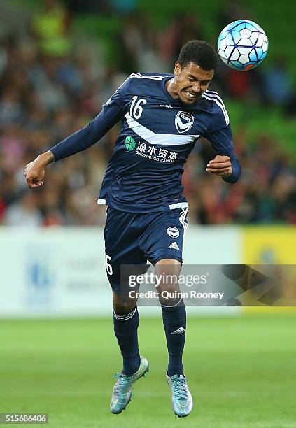 Rashid Mahazi of the Victory heads the ball during the AFC Champions League match between the Melbourne Victory and Suwon Samsung Bluewings FC at...