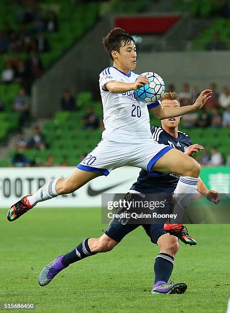 Baek Jihoon of Suwon chests the ball infront of Oliver Bozanic of the Victory during the AFC Champions League match between the Melbourne Victory and...