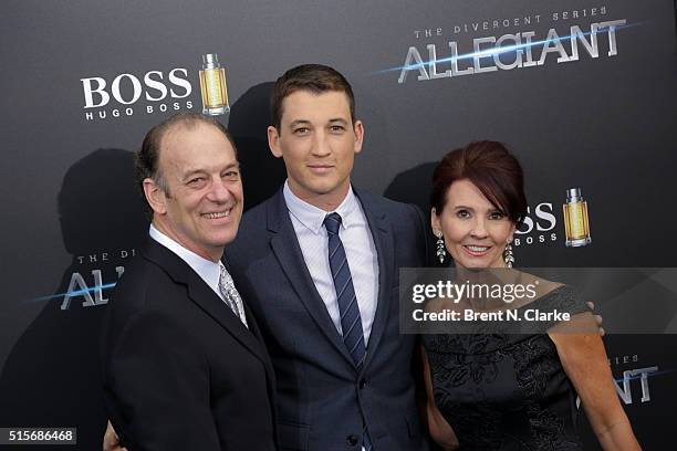 Mike Teller, actor Miles Teller and Merry Flowers attend the premiere of "Allegiant" held at the AMC Loews Lincoln Square 13 theater on March 14,...