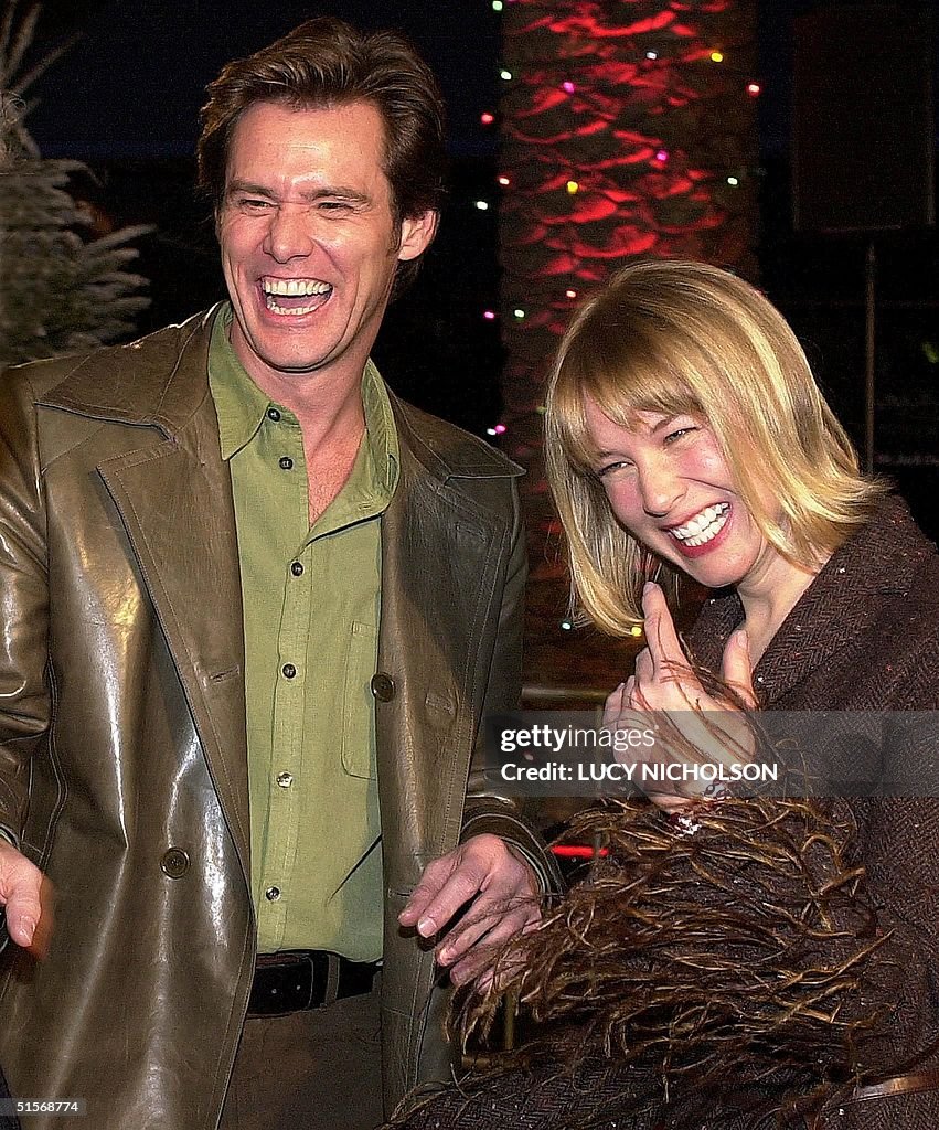 US actor Jim Carrey appears with his girlfriend actress Renee... News Photo Getty Images