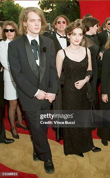 Actress Winona Ryder arrives for the 67th Annual Academy Awards with her boyfriend David Pirner 27 March in Los Angeles. Ryder received a nomination...