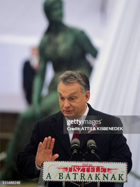 Hungarian Prime Minister Viktor Orban delivers a speech in front of the National Museum of Budapest on March 15, 2016 during official ceremonies to...