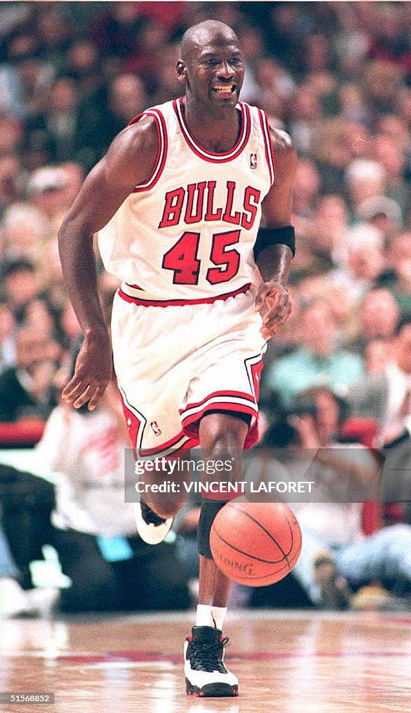 Basketball star Michael Jordan (C) of the Chicago