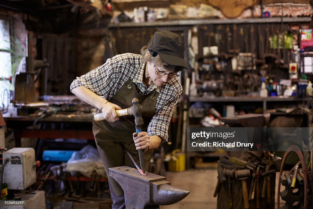 Female blacksmith in her forge