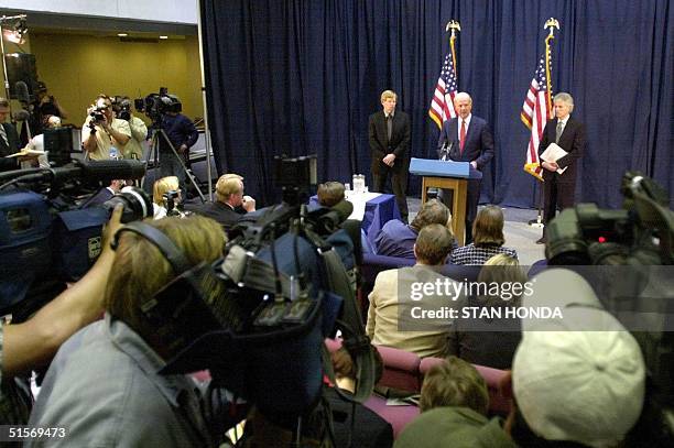 Former US Secretary of State James Baker , flanked by lawyers Ted Olson and Barry Richard , gives a press conference 15 November at the State Capitol...