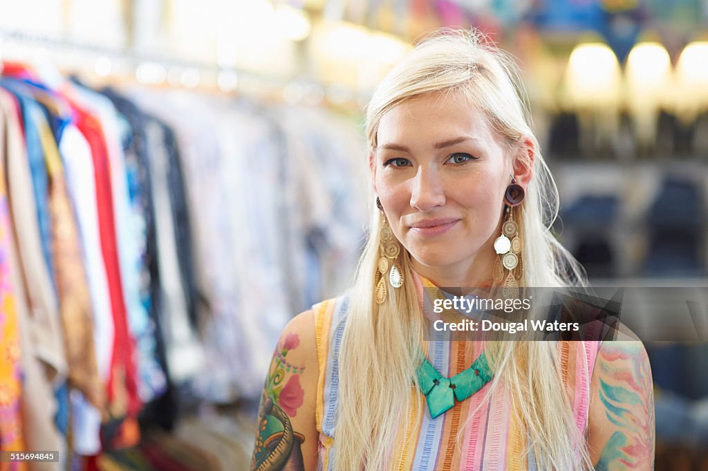 Portrait of vintage clothes shop owner.