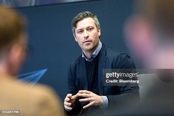 Florian Meissner, chief executive officer of EyeEm Mobile GmbH, gestures as he speaks during the Goldman Sachs Disruptive Technology Symposium 2016...