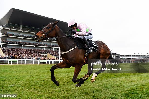 Ruby Walsh rides Douvan to victory in the Racing Post Arkle Challenge Trophy Chase on day one, Champion Day, of the Cheltenham Festival at Cheltenham...