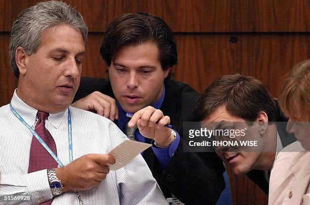 Judge Charles Burton, chairman of the Palm Beach County Canvassing Board , Republican attorney Mark Wallace , unidentified Republican attorney and...
