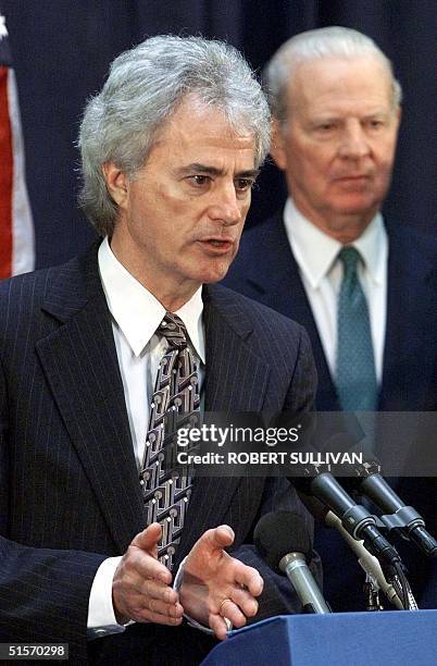 Republican lawyer Barry Richard speaks in front of James Baker as they lay out their court strategy 28 November 2000, in Tallahassee, FL. Democratic...