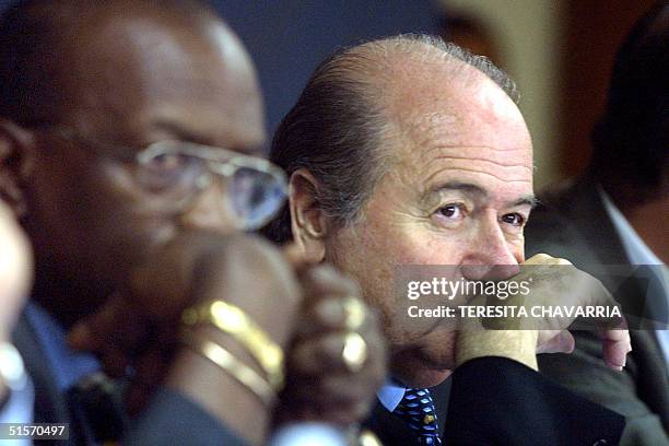 Jack Warner president of the Confederation of Football and Joseph Blatter president of the Federation Internationale de Football participate in a...