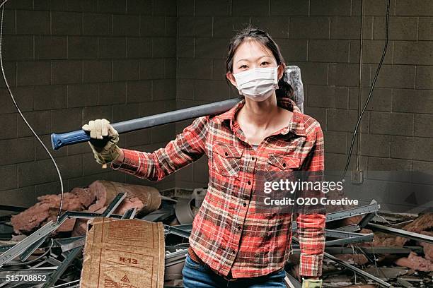 female construction worker - sledgehammer stock pictures, royalty-free photos & images