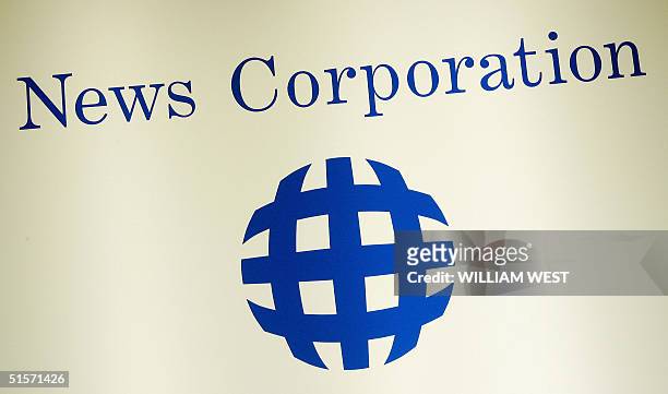 News Corporation logo adorns the wall, during the AGM held in Adelaide 26 October 2004. News Corp shareholders are expected to vote in support of...