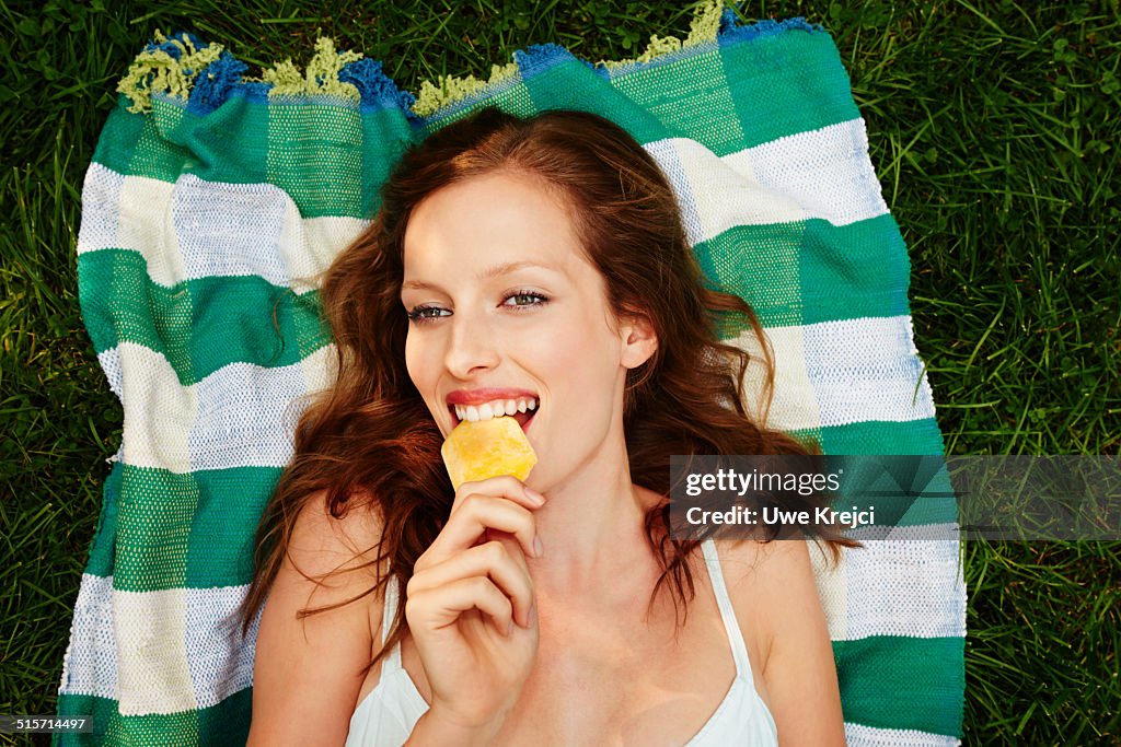 Young woman eating icecream