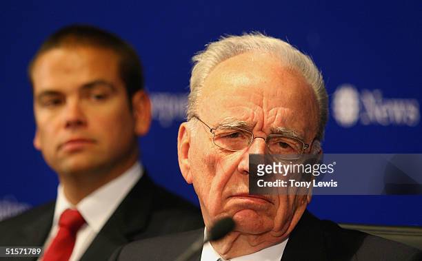 Rupert Murdoch, CEO of News Corporation fields a question watched by his son Lachlan Murdoch, chairman of News Limited, after News Corporation's...