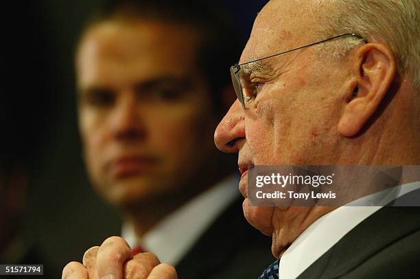 Rupert Murdoch, CEO of News Corporation fields a question watched by his son Lachlan Murdoch, chairman of News Limited, after News Corporation's...