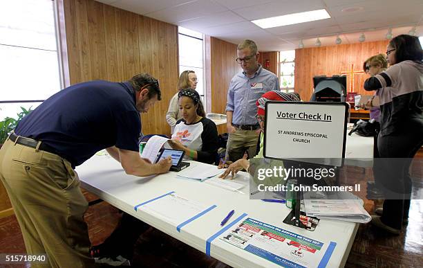 Ohio voters go to the polls for the Ohio primary March 15, 2016 at St. Andrews Episcopal Church in Cincinnati, Ohio. Voters cast ballots in the...