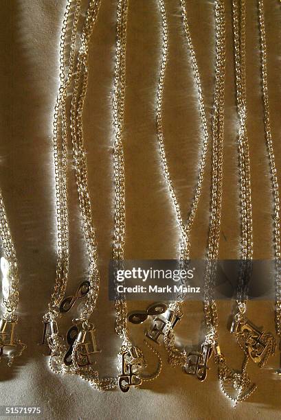 Models jewelry pictured backstage for the Enyce/Lady Enyce Spring 2005 show at the Mercedes-Benz Fashion Week at Smashbox Studios in Culver City,...