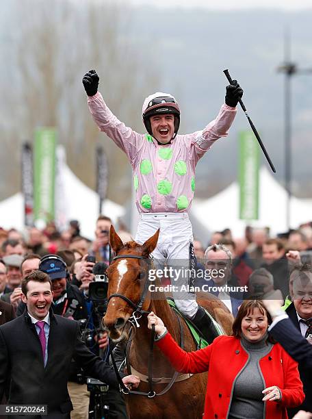 Ruby Walsh celebrates after riding Annie Power to win The Stan James Champion Hurdle Challenge trophy at Cheltenham racecourse on March 15, 2016 in...