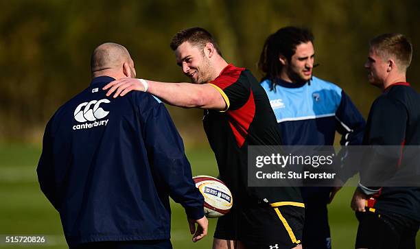 Wales captain Dan Lydiate shares a joke with Cardiff Blues front row Craig Mitchell during training ahead of their RBS 6 Nations match against Italy...